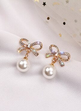 Gold Pearl Bowtie Earrings | Joy - Red Velvet