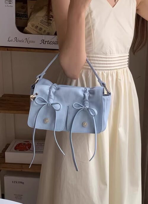 Sky Blue Mini Drawstring Bow Sling Bag | Wonhee – ILLIT